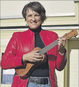  ?? JOnaThan Riley/TC Media ?? Angela Dwyer, one of the organizers of the Marigold Ukulele Festival in Truro, is looking forward to the ukulele concert Saturday night with Chalmers Doane and James Hill performing.