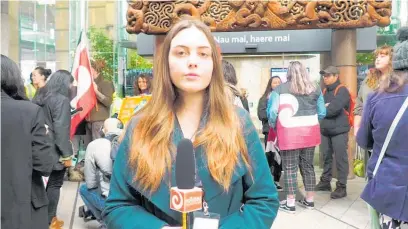  ?? ?? EIT graduate Harata Taurima-Thomas is enjoying her internship at Ma¯ori Television in Auckland. This photo is of her reporting on the Protect Pu¯tiki demonstrat­ion outside the Auckland City Courthouse.