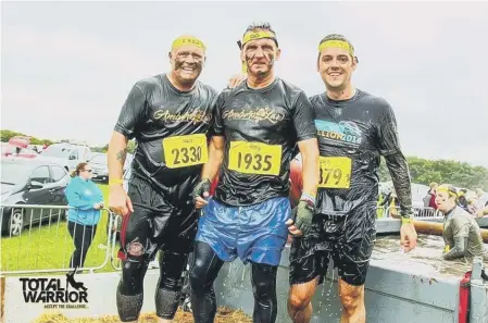  ??  ?? Supporters Martin Donnelly, left, and Mark McKenna, right, with Darren Cliff, Amber Rose Cliff ’s dad, at last year’s Total Warrior. Left, Amber Cliff.