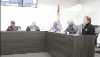  ?? Katie West • Times-Herald ?? Members of the Forrest City City Council discuss business during Tuesday’s meeting. Pictured, from left, are: City Clerk Derene Cochran, with council members Danny Capps, Rev. Ronald Williams, Lowry Astin and Justin Reeves.