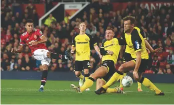  ??  ?? Unloved...Manchester United’s Jesse Lingard scores against Burton Albion in this season’s League Cup