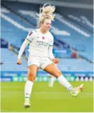  ?? ?? Hair we go: Lauren Hemp celebrates after scoring Manchester City’s third yesterday