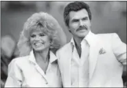  ?? THE ASSOCIATED PRESS FILE ?? Burt Reynolds and Loni Anderson attend at a polo match in Boca Raton, Fla., in 1987.