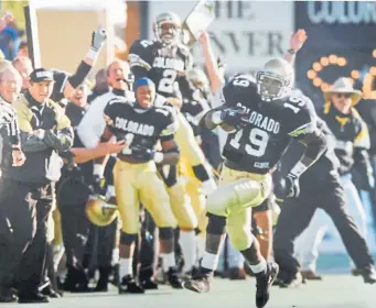  ?? Cliff Grassmick, Daily Camera file ?? CU’S Rashaan Salaam, the 1994 Heisman Trophy winner, surpasses 2,000 yards rushing for that season with the above run against Iowa State.