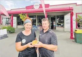  ?? Picture: STUFF ?? Loretta and Shane Paterson are selling after two decades that saw their original shop - the tiny Sheffield bakery - transforme­d into an
‘institutio­n’.