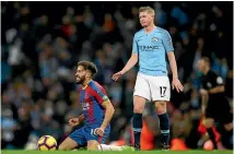  ??  ?? Crystal Palace’s Andros Townsend as Manchester City’s Kevin De Bruyne looks dejected.