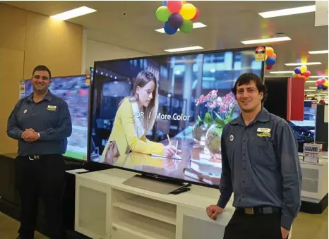  ?? PHOTO: CONTRIBUTE­D ?? HIGH END: Joyce Mayne Toowoomba sales and customer service staff Tony Wigan and Mark Burton show off the range of flatscreen television­s in store.