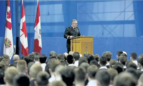  ?? LARS HAGBERG/THE CANADIAN PRESS ?? Chief of Defence Staff General Jonathan Vance speaks with cadets Wednesday at the Royal Military College of Canada in Kingston, Ont.