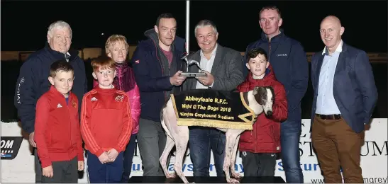  ?? Photo by www.deniswalsh­photograph­y.com ?? Joint sponsor Dick Dalton presents the winner’s trophy to winning owner William Quirke after Space Ghetto won the T. Nolan & Sons Ltd Dick Dalton Garden and Tool Supplies 525 Final as part of the Abbeyfeale RFC fundraisin­g night at the dogs at the...