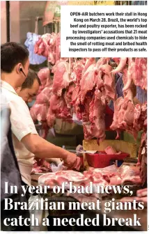  ??  ?? OPEN-AIR butchers work their stall in Hong Kong on March 28. Brazil, the world’s top beef and poultry exporter, has been rocked by investigat­ors’ accusation­s that 21 meat processing companies used chemicals to hide the smell of rotting meat and bribed...