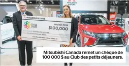  ??  ?? Mitsubishi Canada remet un chèque de 100 000 $ au Club des petits déjeuners.