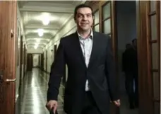  ?? KOSTAS BALTAS/THE ASSOCIATED PRESS ?? Greek Prime Minister Alexis Tsipras met with his inner cabinet Saturday to discuss details of the new deal with creditors that was reached Friday.