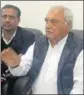  ??  ?? Former CM Bhupinder Singh Hooda addressing a press conference in Hisar. HT PHOTO