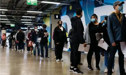  ?? Photograph: Maciek Musialek/NurPhoto/Rex/Shuttersto­ck ?? Queue for Covid jabs, London, June 2021. All adults in the UK aged 18 can now receive a vaccine, with walk-in clinics requiring no appointmen­ts often available.