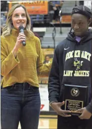  ?? kevin Myrick ?? Caroline Williams Hipps (left) addresses the crowd while standing next to Rockmart’s Keyarah Berry after the junior broke her record for most points scored by a Rockmart player Friday.