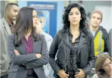  ?? FOX ?? Emmys-snubs Melissa Fumero, left, and Stephanie Beatriz appear in a scene from the comedy series, Brooklyn Nine-Nine. Beatriz worked extensivel­y in theatre and enjoyed the freedom of appearing in a range of “colourblin­d” stage roles as well as playing...