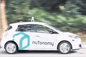  ?? PHOTO: EPA ?? A nuTonomy self-driving vehicle pictured in Singapore. The developer invited a select group of people to try it’s “robo-taxi” hoping to get feedback ahead of its launch in 2018.