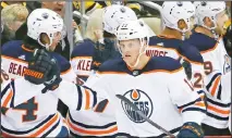  ??  ?? In this Nov 2, 2019 file photo, Edmonton Oilers’ Colby Cave (12) returns to the bench after scoring during the second period of an NHL hockey game
against the Pittsburgh Penguins in Pittsburgh.