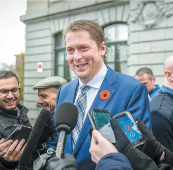  ?? PHOTO JEAN-FRANÇOIS DESGAGNÉS ?? Le chef de l’opposition officielle à Ottawa, Andrew Scheer, a rencontré la presse à Québec, hier, à l’issue de sa rencontre avec le premier ministre François Legault.