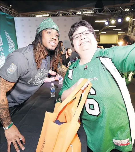  ?? TROY FLEECE ?? Receiver Naaman Roosevelt, seen taking a selfie with a fan during CFL Week, led the Riders in receptions last season.