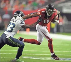  ?? DALE ZANINE, USA TODAY SPORTS ?? Wideout Julio Jones, right, is a key to the Falcons offense, but he has been dealing with foot and toe issues.