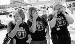  ?? JOHN LOCHER/AP ?? California­ns Linda Hazelwood, from left, Michelle Hamel and Jann Blake attend a prayer service Monday in Las Vegas. The three attended the country music festival last year.