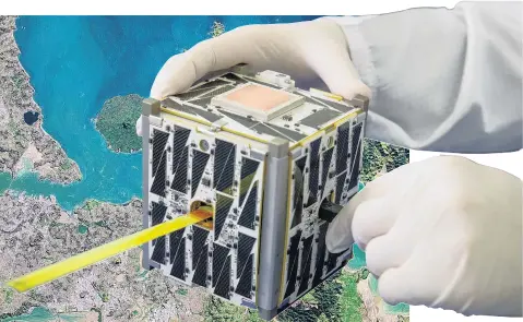  ?? PHOTO: NASA ?? Tiny . . . A cubesat like the ones built and used by Spire Global Inc, ‘‘a leading spacetoclo­ud data analytics company’’, with whom CSST has partnered.