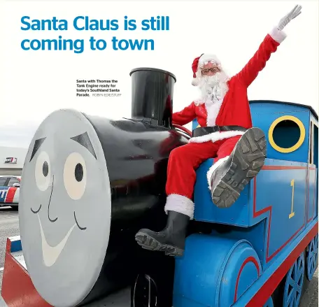  ??  ?? Santa with Thomas the Tank Engine ready for today’s Southland Santa Parade. ROBYN EDIE/STUFF