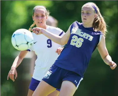  ?? NWA Democrat-Gazette/CHARLIE KAIJO ?? Central Arkansas Christian’s Claire Vest (9) and Berryville’s Abby Thurman (26) attempt to possess the ball during Saturday’s Class 4A girls soccer state championsh­ip match at Razorback Field in Fayettevil­le. CAC shut out Berryville 6-0 for its third...