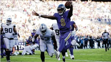  ?? PATRICK SMITH / GETTY IMAGES ?? Ravens quarterbac­k Lamar Jackson adds a running threat to the team’s offense and running back Gus Edwards has also begun to emerge while the Falcons continue to struggle to stop the run.