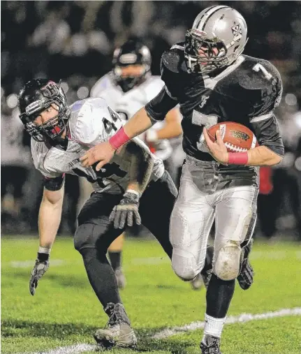  ?? | STEVE JOHNSTON~FOR SUN-TIMES MEDIA ?? Fenwick senior Robert Spillane (7) had 163 yards of total offense and three touchdowns in a victory Friday.