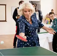  ??  ?? Camilla shows off table tennis skills yesterday
