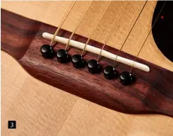  ??  ?? Both the nut and compensate­d saddle are bone on the Martin. The bridge and fingerboar­d are made from rosewood