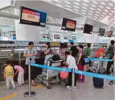  ?? REUTERS PIC ?? Cheaper labour costs and better road and rail links mean Shenzhen can wrest some growth from Hong Kong in the years ahead.