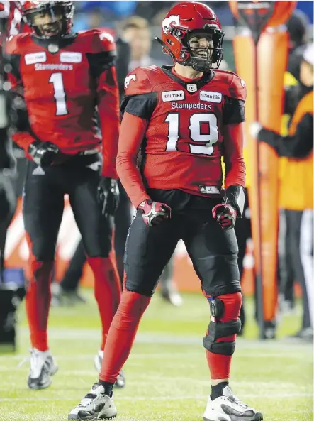  ?? GAVIN YOUNG ?? Calgary Stampeders quarterbac­k Bo Levi Mitchell had reason to celebrate after throwing for two touchdowns in a 27-16 win over the Ottawa Redblacks in Sunday’s Grey Cup Game at Commonweal­th Stadium.