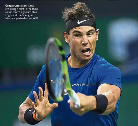  ??  ?? Great run: Rafael Nadal returning a shot in the thirdround match against Fabio Fognini at the Shanghai Masters yesterday. — AFP