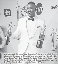  ??  ?? Actor Mahershala Ali, winner of the Outstandin­g Performanc­e by a Male Actor in a Supporting Role award for ‘Moonlight,’ poses in the press room during The 23rd Annual Screen Actors Guild Awards at The Shrine Auditorium on Sunday in Los Angeles,...