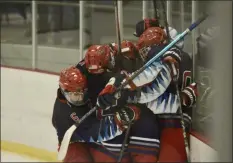  ?? BY JOE BOYLE JBOYLE@ DIGITALFIR­STMEDIA.COM @BOYLERALER­TTROY ON TWITTER ?? The Mohawks celebrate their third goal of the night on January 8. It was the eventual game winner against LaSalle on Hudson Valley Community College.