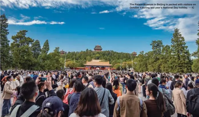  ?? ?? The Palace Museum in Beijing is packed with visitors on October 4 during last year’s National Day holiday. — IC