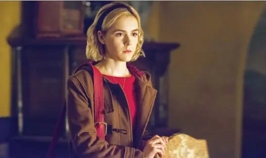  ?? NETFLIX ?? Kiernan Shipka stars in the Chilling Adventures of Sabrina, a timely a series that explores power and gender disparity. But don’t worry, it’s still fun and entertaini­ng.