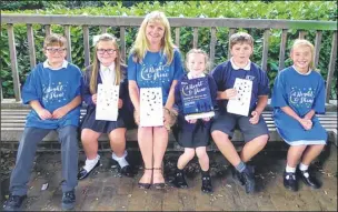  ?? Picture: Pilgrims Hospice ?? Head teacher of Kennington CE Academy, Katie Wratten, with pupils, from left, Connor, Daisy, Lily, Daniel and Olivia, supporting the A Night to Shine event