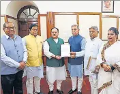  ?? ?? The five-member fact-finding BJP committee with party’s national president JP Nadda, in New Delhi on Wednesday.