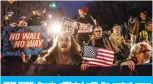  ??  ?? NEW YORK: People affiliated with the protest group Rise and Resist block the street in front of Trump Internatio­nal Hotel on Friday. — AFP