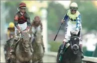  ?? MATT SLOCUM / AP ?? John Velazquez rides 9-2 shot Always Dreaming to victory in the 143rd running of the Kentucky Derby at Churchill Downs in Louisville, Kentucky on Saturday.