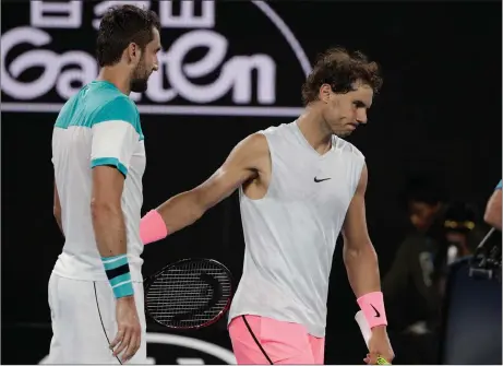  ?? Picture: DITA ALANGKARA, AP ?? I GAVE IT MY ALL: Rafa Nadal congratula­tes Marin Cilic as he withdraws injured during their match at the Australian Open yesterday.