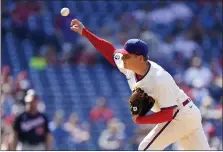  ?? MATT SLOCUM — THE ASSOCIATED PRESS ?? Phillies starter Spencer Howard tosses one during the first inning Saturday at Citizens Bank Park. He’d last through seven Nationals batters.