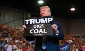  ??  ?? Trump at a West Virginia rally in 2017. The continued embrace of Trumpian rhetoric has concerned some younger Republican lawmakers. Photograph: Saul Loeb/AFP/Getty Images