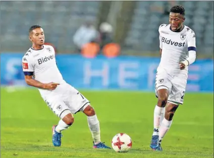  ?? Photo: Lefty Shivambu/Gallo Images ?? Clever boys: Daine Klate (left) and Phakamani Mahlambi of Bidvest Wits have two matches left to play in the Absa Premiershi­p, inducing a tough encounter with Kaizer Chiefs.