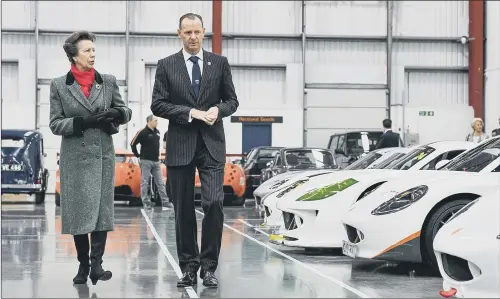  ?? PICTURE: CHRIS WALLBANK. ?? MARKING A MILESTONE: Ginetta chairman Lawrence Tomlinson guides Princess Anne during her tour of the Ginetta site in Garforth for its 60th anniversar­y.