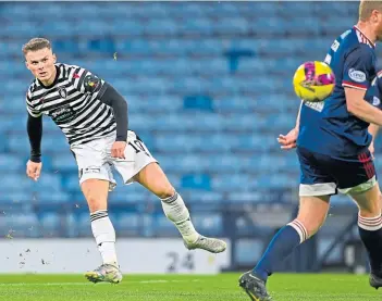  ?? ?? Josh McPake slots home to put Queen’s Park 3-0 ahead in the 36th minute